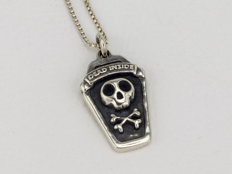 Dead Inside pendant: a coffin-shaped sterling silver pendant with a skull, crossbones and a 'Dead Inside' banner